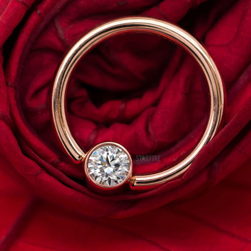 Captive Bead Ring (CBR) in Gold with Bezel-set Synthetic Tanzanite Captive Bead - Image 3