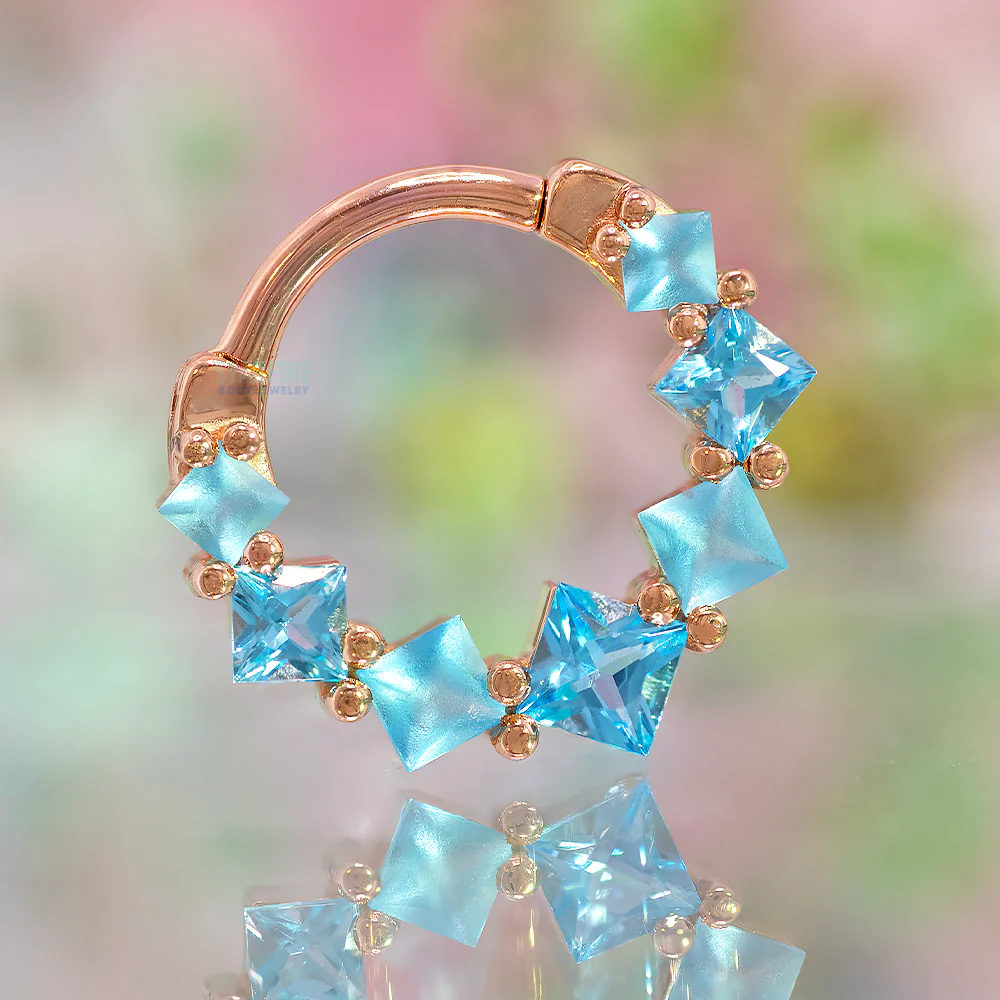 Graduating Tiffany Hinge Ring in Gold with Swiss Blue Topaz with Alternating Sandblasted Gems - Image 2