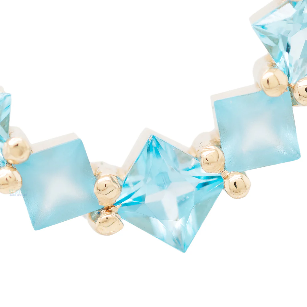 Graduating Tiffany Hinge Ring in Gold with Swiss Blue Topaz with Alternating Sandblasted Gems - Image 3